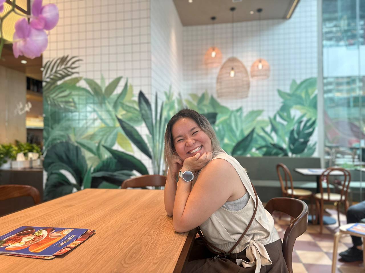 Custom indoor botanical mural painting for a cafe feature wall in Kuala Lumpur
