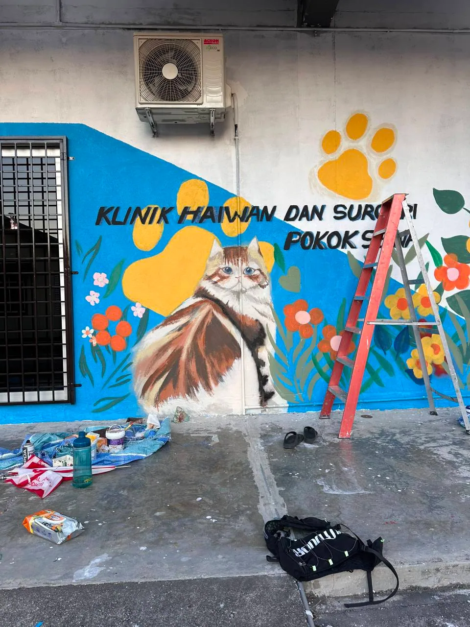 Outdoor waterproof mural painted on an exterior animal clinic wall in Selangor